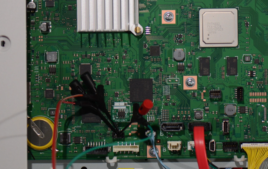 Canon C5850i Mainboard with Test Leads Connecting Connector J32 to an USB to Serial Adapter